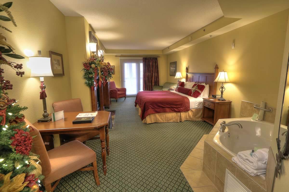 King Mini Suite: In-room whirlpools, gas fireplaces, and private balconies are available in select lodging including King mini suites, two-room suites, and the Santa Suite.